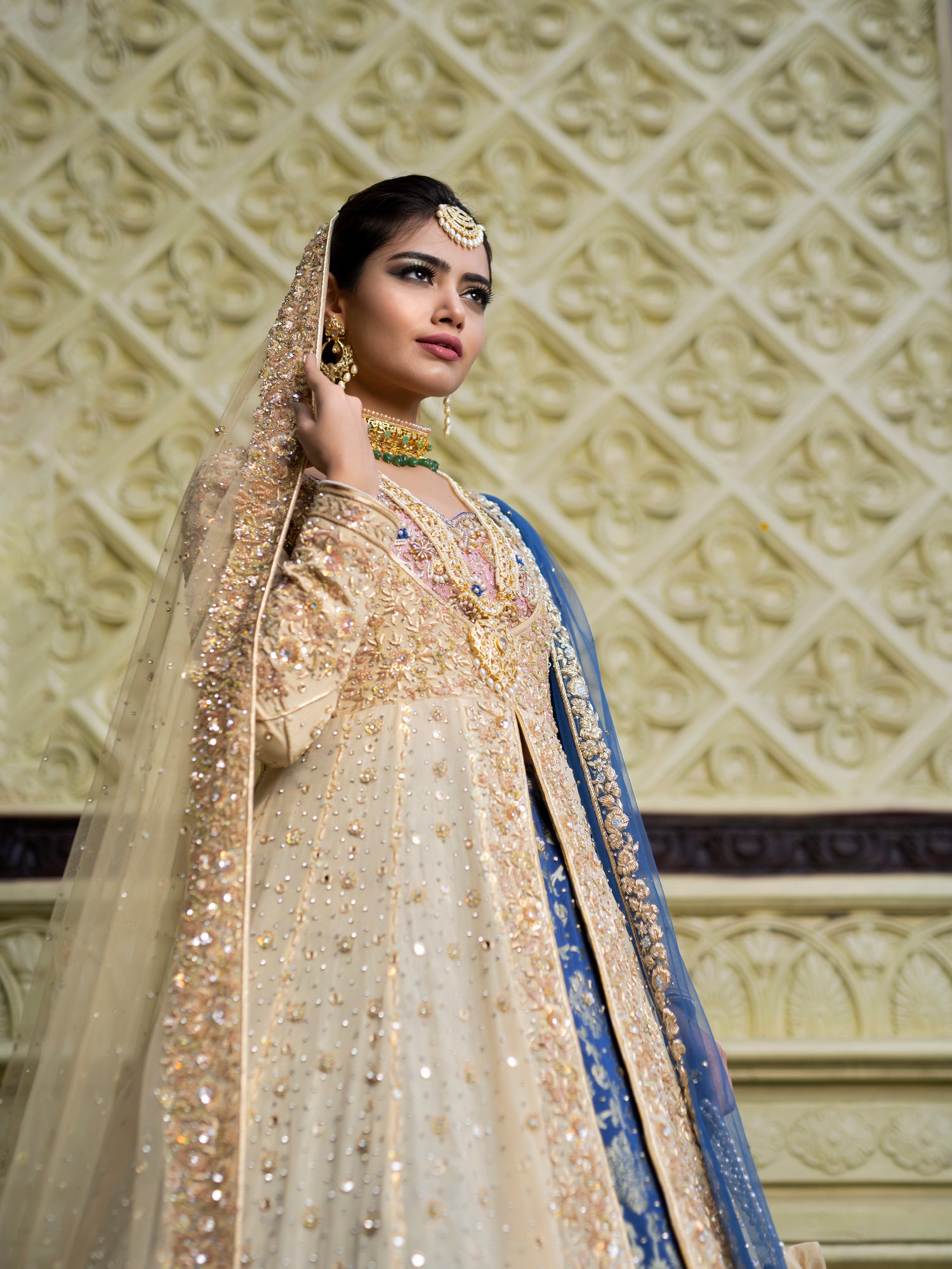 Golden jacket with teal lehenga