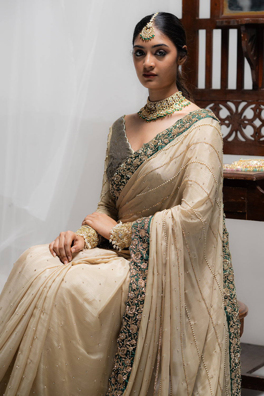 Elegant Beige Embroidered Saree